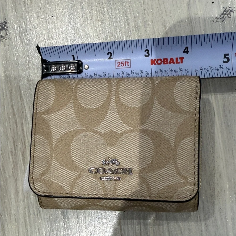 Coach Beige Signature Trifold Wallet- Pink Leather Interior